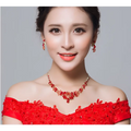Red crystal bridal jewelry featuring a red beaded necklace with gold-toned accents and floral charms clothing accessories wholesale
