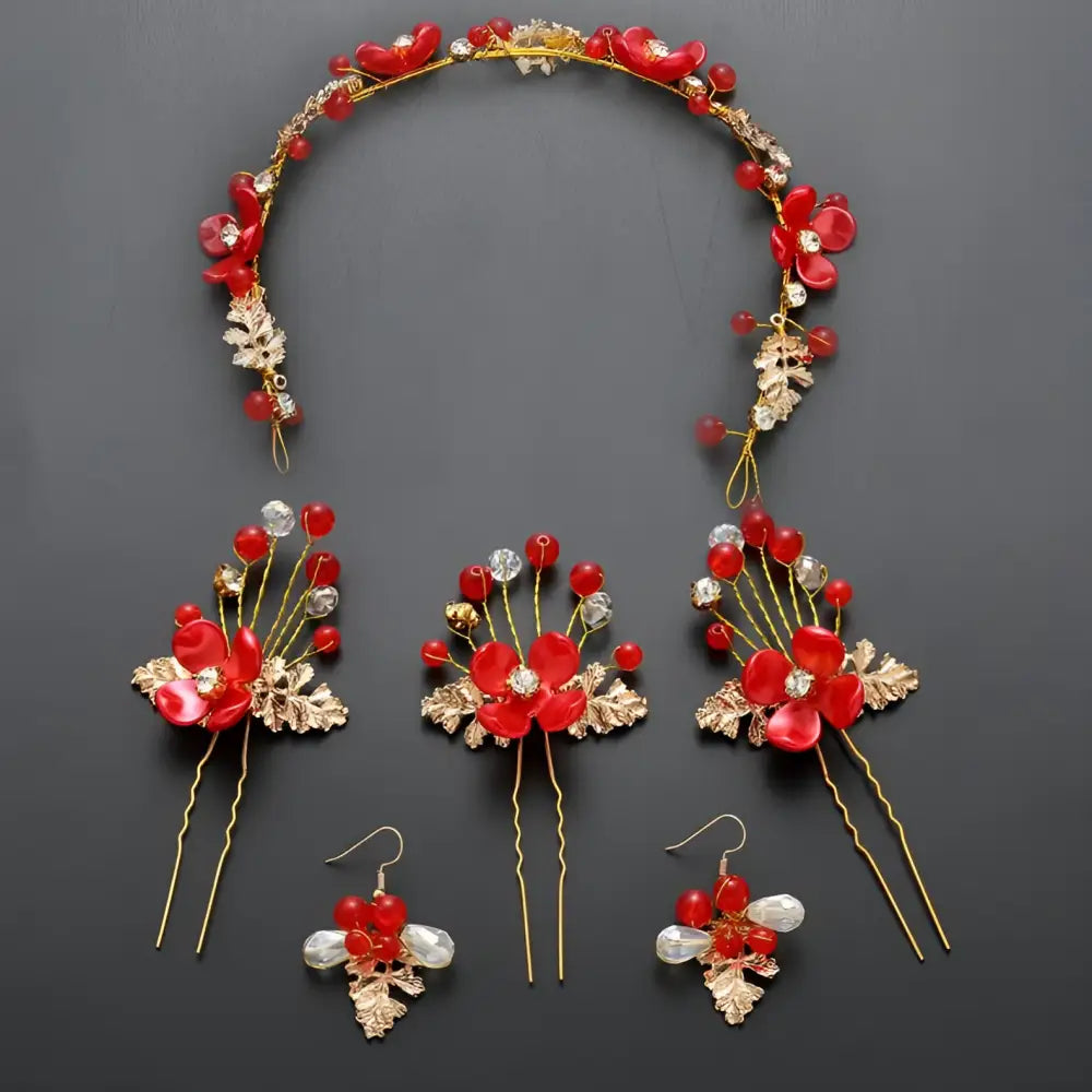 Red floral costume jewelry set with gold-toned leaves and crystal accents for wedding hair accessory