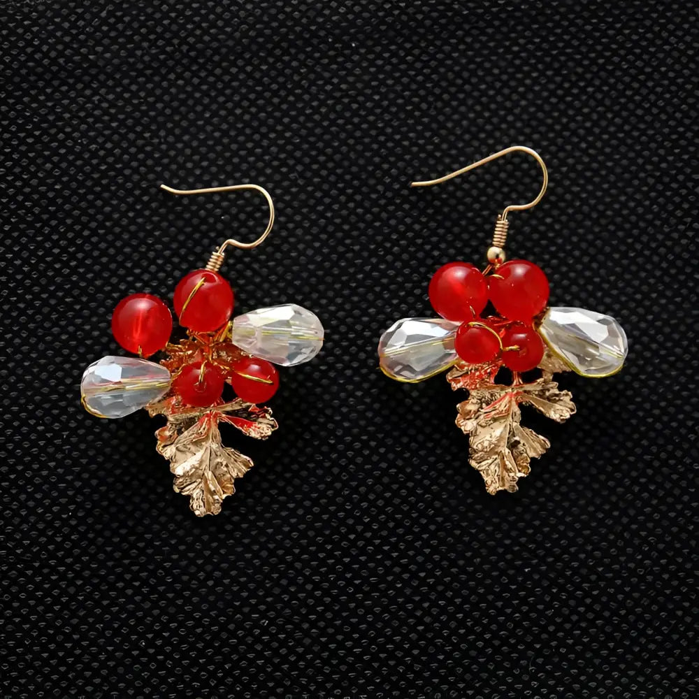 Red and clear crystal grape cluster earrings with gold-tone leaf accents in a floral costume jewelry set for wedding use