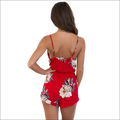 Red floral print jumpsuit image featuring a luxury women’s fashion romper with thin straps and ruched waistband
