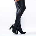 Black over-the-knee boots with glossy leather finish and block heels featuring a pointed high heel design
