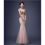 A blush pink fish tail banquet evening dress with red gold beaded lace detailing and sheer tulle overlay