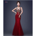 Deep red gold beaded fish tail banquet evening dress with intricate gold embroidery along v neckline and sides