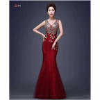Deep red gold beaded fish tail banquet evening dress with intricate gold embroidery along v neckline and sides