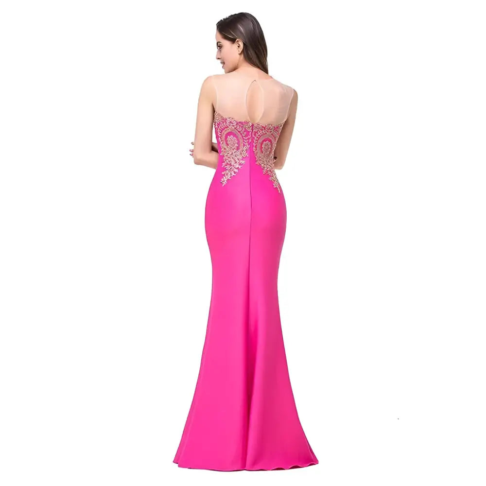 A vibrant fuchsia red gold beaded fishtail skirt evening gown with sheer back and intricate gold lace detailing