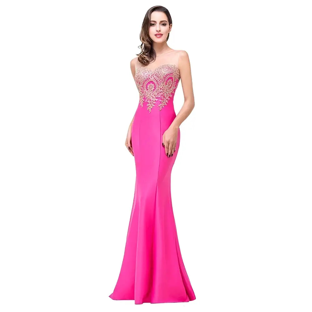 A vibrant fuchsia red gold beaded fishtail skirt evening gown with a fitted bodice and intricate gold lace detailing