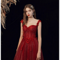 Red lace off shoulder wedding toast dress with shimmering red lace floral appliqués and a sparkling bodice for host annual events