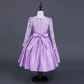 Red lace princess dress long sleeve satin skirt with fitted bodice floral embroidery and full skirt bow waist