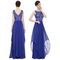 A royal blue lace spliced chiffon gown with a lace bodice and flowing chiffon skirt for evening wear