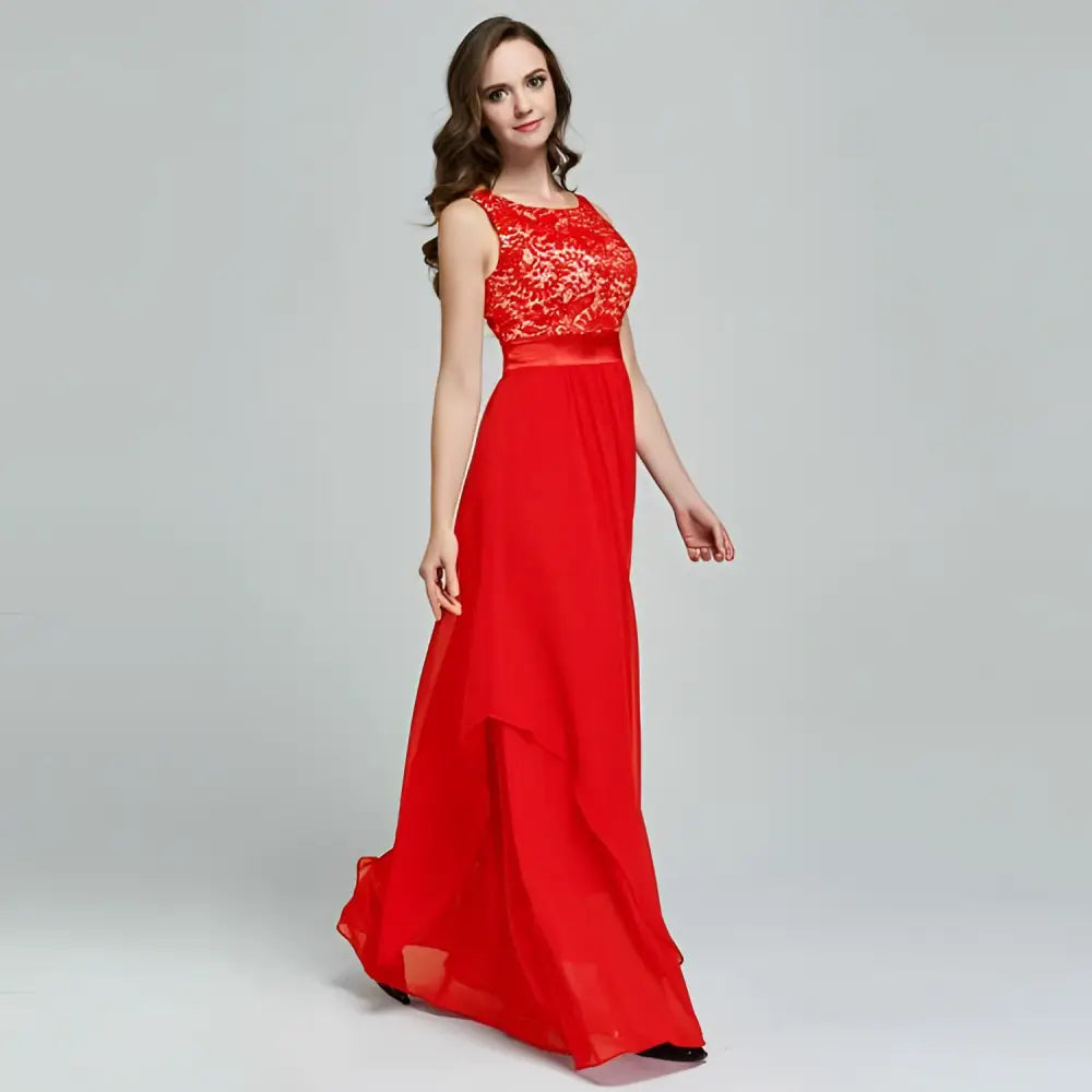 A vibrant red lace spliced chiffon gown featuring an intricate lace bodice and a flowing chiffon skirt