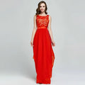 A vibrant red lace spliced chiffon gown featuring an intricate lace bodice and a flowing chiffon skirt