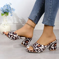 White and brown leopard square toe mule sandals with block heels for summer wear