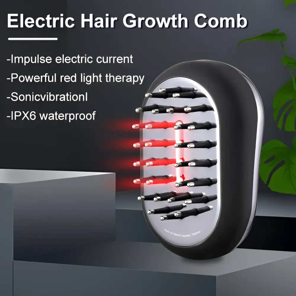 Black and silver electric hair care growth comb with red light therapy leds for enhanced scalp stimulation