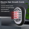Black and silver electric hair care growth comb with red light therapy leds for enhanced scalp stimulation