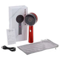 Red handheld scalp care massage device with circular led head and sleek metallic finish for red light scalp therapy