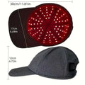 Black red light therapy baseball cap with red illuminated panels and denim-like fabric exterior light therapy cap