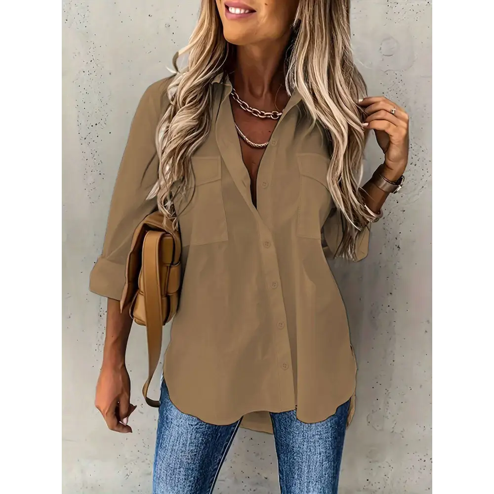 Beige loose long sleeve button lapel shirt with two chest pockets and rolled sleeves for casual wear