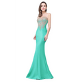 Teal mermaid-style toast gown with intricate gold embroidery on sheer bodice and smooth satin fabric for red mermaid bride