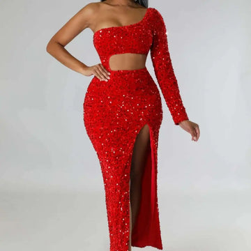 A dazzling red one shoulder gown featuring fashionable sequins sexy design with navel split and long sleeve
