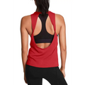 Back view of red open back workout tank with cut-out design layered over black sports bra for yoga workout clothes