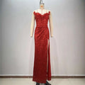 A shimmering red paillette slit sequin gown with a sweetheart neckline tube high slit and thin spaghetti straps