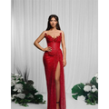A shimmering red paillette tube high slit sequin gown with intricate floral embellishments at the neckline and side slit
