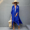 Vibrant royal blue rayon embroidered holiday sun protection cardigan with white cross patterns and scalloped hem