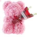 Pink foam rose bear adorned with a red ribbon wrapped bouquet in a red rose bear eternal flower gift box