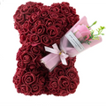 A red rose bear crafted from dense artificial roses with a pink rose bouquet tied in satin for eternal flower gift