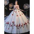 A white off-the-shoulder ball gown with red rose embroidery lace detailing for temperament bride bra wedding dress