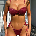 A shiny deep burgundy red ruched steel bracket push up metallic bikini with ruched fabric and sparkling strap embellishments