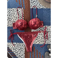 Shiny red ruched steel bracket push up metallic bikini set with structured bra top and thong bottom with white trim