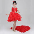 A vibrant red sleeveless wedding flower girl dress with a beaded bodice and layered ruffled skirt for girls