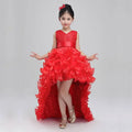 A vibrant red sleeveless lace bodice ruffled girls dress wedding flower girl gown with a high low layered skirt