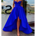 A vibrant royal blue satin ladies evening dress with a strapless sweetheart neckline and high low hemline