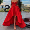 A vibrant red satin ladies evening dress featuring a sweetheart neckline and a high low hemline