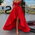 A vibrant red satin ladies evening dress featuring a sweetheart neckline and high low hemline