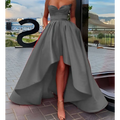 A sleek gray satin high low ladies evening dress with sweetheart neckline and flared skirt