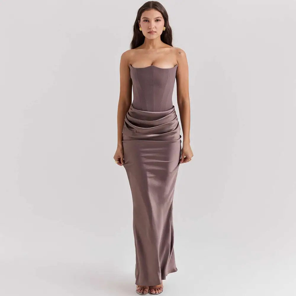 A sleek mauve satin long dress with a fitted bodice featuring fashion bandeau mermaid style design