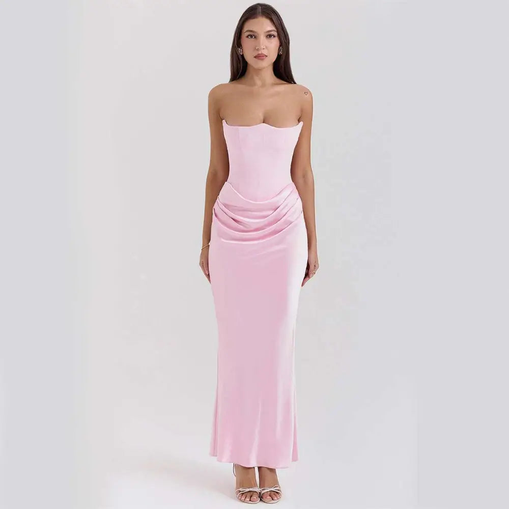A sleek pink satin long dress with a fitted bodice and draped waistline fashion bandeau mermaid gown