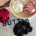 Three satin rose hair band scrunchies in red white and pink with one black scrunchie for bun ponytail advanced sense styling