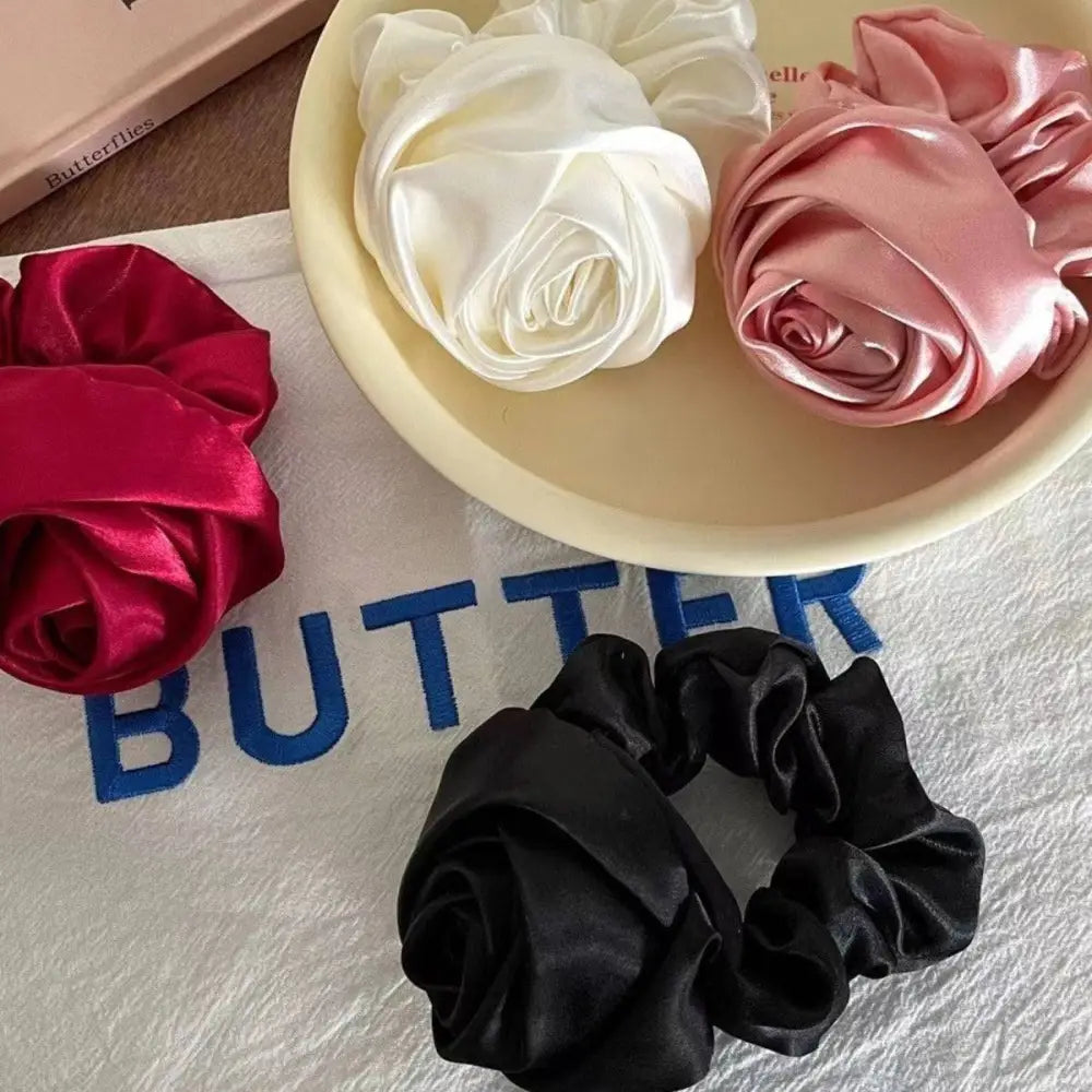Three satin rose hair band scrunchies in red white and pink with one black scrunchie for bun ponytail advanced sense styling