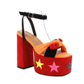Red star appliqué chunky high heel platform sandals in red with orange and black straps and colorful star details
