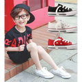White canvas low-top red toddler casual shoes student style with black rubber soles and red stitching details