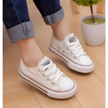 White canvas red toddler casual shoes student style with black and red rubber soles and silver eyelets for children’s clothing