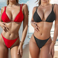 Red and black triangle cup halter bikini set with thin straps and high-cut bottoms in halter bikini design