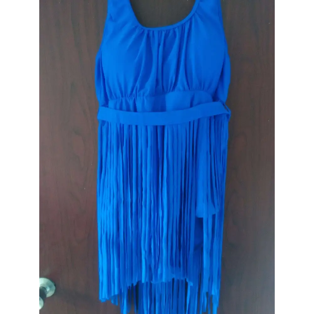 A vibrant royal blue red triangle slimming plus sleeveless dress with a fitted bodice and plus size fringe detail