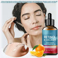 A sleek amber glass bottle with black dropper cap labeled rozino retinol and collagen anti wrinkle moisturizing oil