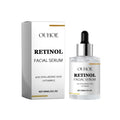 Ouhooe retinol anti aging tightening liquid in a clear glass serum bottle with silver dropper and white gold-accented box