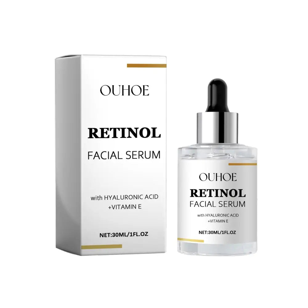 Ouhooe retinol anti aging tightening liquid in clear glass bottle with silver dropper and white box with gold accents